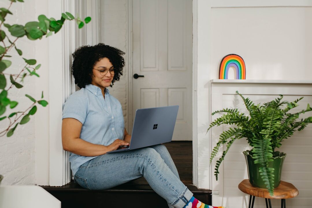 person using laptop at home